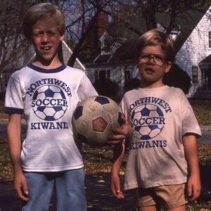 A picture of Adam and Karl with a soccer ball, which has the same shape as a buckyball.