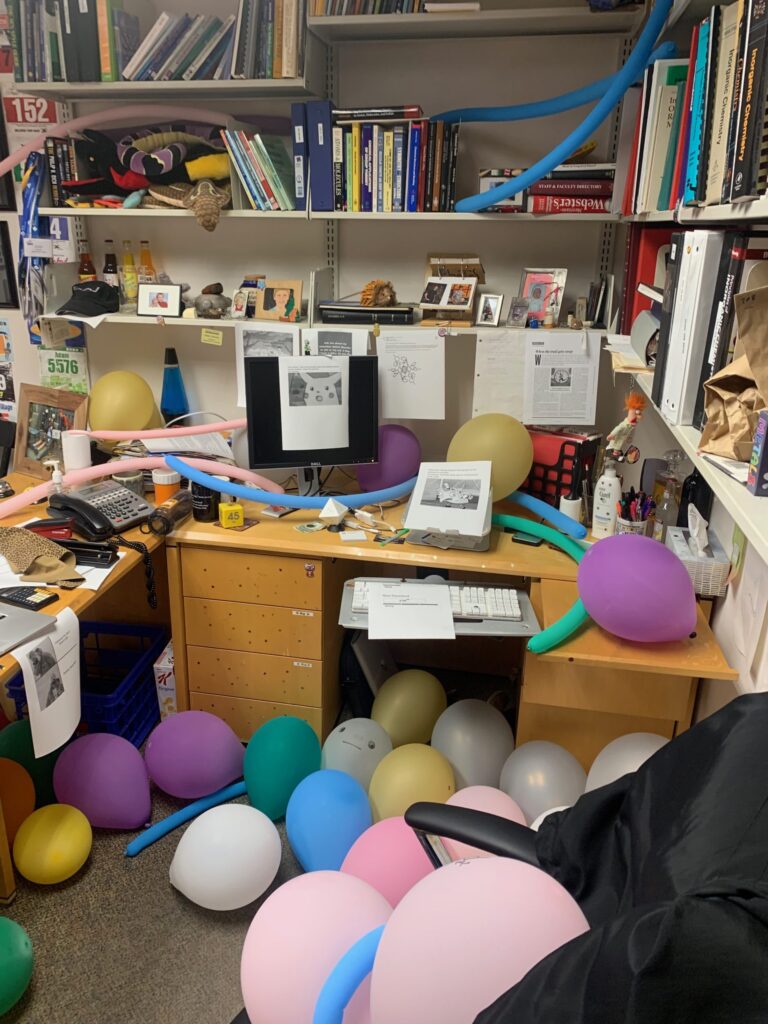 Adam's office after he got pranked by students with 500 balloons. Its still a mess though.
