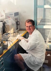 The best part of waking up, is surgical needles in your hands. A photo of Karl working in the lab in Cambridge.