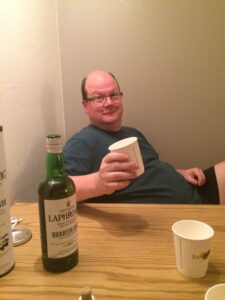 Photographic evidence of Karl breaking both Scottish national and Utah state laws by holding Laphroig in a paper cup.